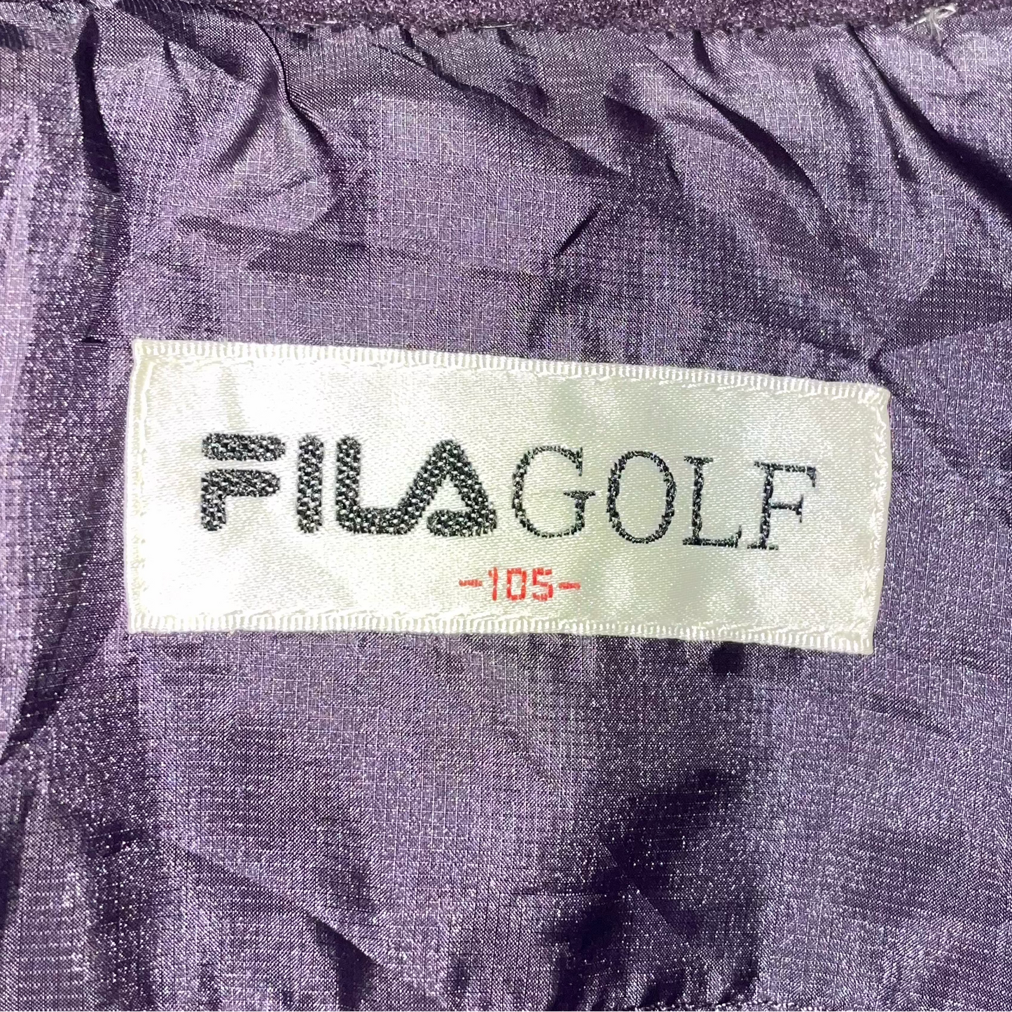 VINTAGE FILA PURPLE GOLF PUFFER JACKET (XL)